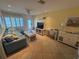 Bright living room with comfortable seating and coastal decor at 2310 Gulf N Dr # 205, Bradenton Beach, FL 34217