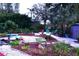 Landscaped backyard with a stone and mulch garden at 2426 Nassau St, Sarasota, FL 34231