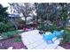 Relaxing patio with fire pit and canal views, perfect for outdoor entertaining at 2426 Nassau St, Sarasota, FL 34231