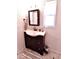 Bathroom with updated vanity, toilet and a bright, airy feel at 2426 Nassau St, Sarasota, FL 34231