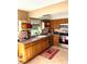 Well-equipped kitchen with wood cabinets, and modern appliances at 2426 Nassau St, Sarasota, FL 34231