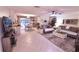 Open concept living and dining area with tile floors and access to backyard at 2426 Nassau St, Sarasota, FL 34231