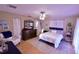 Spacious main bedroom with plush bed, dresser, and calm color scheme at 2426 Nassau St, Sarasota, FL 34231