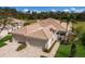 Luxury villa with two-car garage, situated on a beautifully landscaped lot at 4004 Oakley Greene # 37, Sarasota, FL 34235