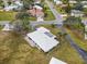 Aerial view showcasing a single-story house with a tile roof in a quiet neighborhood at 430 Botticelli Dr # 430, Nokomis, FL 34275