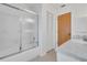 Bathroom with shower/tub combo, vanity, and linen closet at 430 Botticelli Dr # 430, Nokomis, FL 34275