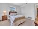 Bedroom with a queen bed, nightstand and closet at 430 Botticelli Dr # 430, Nokomis, FL 34275