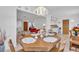 Bright dining room features an octagonal table and chairs, offering ample space for Gathering meals at 430 Botticelli Dr # 430, Nokomis, FL 34275