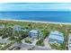 Beachfront home with ocean views and palm trees at 506 S Casey Key Rd, Nokomis, FL 34275