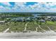 Beachfront community with homes and sandy beach at 506 S Casey Key Rd, Nokomis, FL 34275