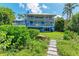 House exterior view with walkway and landscaping at 506 S Casey Key Rd, Nokomis, FL 34275