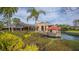 Clubhouse with patio and water view at 5218 Wedgewood Ln # 72, Sarasota, FL 34235