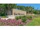 The Meadows community entrance with landscaping at 5218 Wedgewood Ln # 72, Sarasota, FL 34235