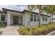 Modern fitness center with palm trees and landscaping at 5218 Wedgewood Ln # 72, Sarasota, FL 34235