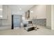 Modern kitchen with white cabinets, stainless steel appliances, and quartz countertops at 5218 Wedgewood Ln # 72, Sarasota, FL 34235