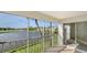 Screened balcony with tranquil lake and golf course views at 5218 Wedgewood Ln # 72, Sarasota, FL 34235