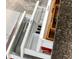 Organized kitchen drawer with labeled dividers for utensils and knives at 5955 Midnight Pass Rd # 4E, Sarasota, FL 34242