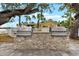 Dual stainless steel grills built into stone; perfect for outdoor entertaining at 5955 Midnight Pass Rd # 4E, Sarasota, FL 34242