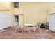 Small patio with table and chairs and access to the unit at 5955 Midnight Pass Rd # 4E, Sarasota, FL 34242