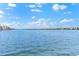 Stunning view of calm water and distant shoreline at 5955 Midnight Pass Rd # 4E, Sarasota, FL 34242