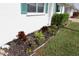 Neat landscaping with mulch and various plants at 6100 Coral Way, Bradenton, FL 34207