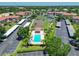 Community pool, tennis courts, and parking at 6505 Stone River Rd # 105, Bradenton, FL 34203