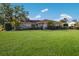 Ranch style home with spacious lawn and mature landscaping at 7603 18Th Nw Ave, Bradenton, FL 34209