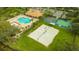 Community sand volleyball court with surrounding green space at 8205 Quail Greens Ter, Bradenton, FL 34212