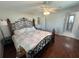 Spacious bedroom with wood floors and a large bed at 9359 Casa Grande Ave, Englewood, FL 34224