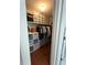 Large walk-in closet with ample storage shelving and drawers at 9359 Casa Grande Ave, Englewood, FL 34224