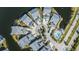 Aerial view of waterfront community with circular drive and pool at 1005 Ibis Ct, Bradenton, FL 34209