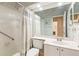 Clean bathroom with white vanity, shower, and toilet at 1005 Ibis Ct, Bradenton, FL 34209