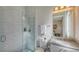 Bathroom with a walk-in shower and modern vanity at 10656 Glencorse Ter, Bradenton, FL 34211