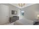 Bedroom with a queen bed, dresser and window at 10656 Glencorse Ter, Bradenton, FL 34211