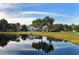 Stunning clubhouse reflected in a tranquil pond at 10656 Glencorse Ter, Bradenton, FL 34211