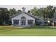 Elegant clubhouse with patio seating near the golf course at 10656 Glencorse Ter, Bradenton, FL 34211