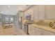 Bright kitchen featuring stainless steel appliances and granite countertops at 10656 Glencorse Ter, Bradenton, FL 34211