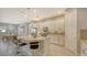 Modern kitchen with stainless steel appliances and granite countertops at 10656 Glencorse Ter, Bradenton, FL 34211