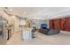 Open concept living area with modern furniture and large artwork at 10656 Glencorse Ter, Bradenton, FL 34211