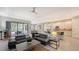 Open living room and kitchen area with modern finishes at 10656 Glencorse Ter, Bradenton, FL 34211