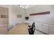Spacious office with large desk and adjacent living area at 10656 Glencorse Ter, Bradenton, FL 34211