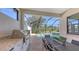 Outdoor kitchen and dining area overlooking the pool at 10656 Glencorse Ter, Bradenton, FL 34211