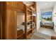 Well-designed ' bunk room with built in storage and window seat at 112 Maple Ave, Anna Maria, FL 34216