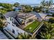 Amazing rooftop deck with outdoor kitchen and games at 112 Maple Ave, Anna Maria, FL 34216