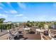 Rooftop deck with ocean views and seating area at 112 Maple Ave, Anna Maria, FL 34216