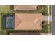 Top-down view of house, pool, and backyard at 11550 Blackfin St, Venice, FL 34292