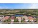 Community overview, showcasing homes and a lake at 11550 Blackfin St, Venice, FL 34292