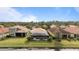 Bird's eye view of house with pool and canal at 11550 Blackfin St, Venice, FL 34292