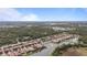 Wide shot of community, lake, and surrounding area at 11550 Blackfin St, Venice, FL 34292