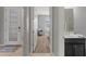 Clean bathroom with a single sink and shower/tub combo at 11550 Blackfin St, Venice, FL 34292